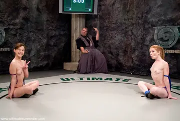 Pale Redhead and Partner Submit to Bondage Restraints