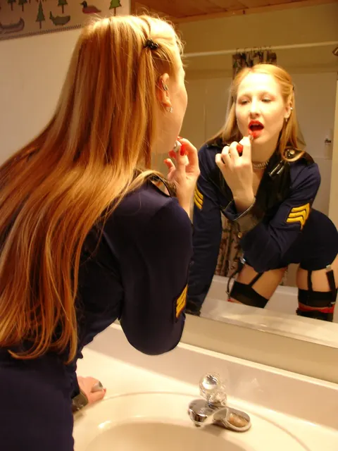 Redhead in Leather Police Uniform Dominates with a Dildo – photo 19 of 20