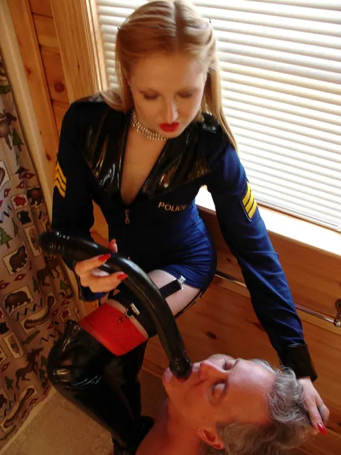 Redhead in Leather Police Uniform Dominates with a Dildo – photo 2 of 20