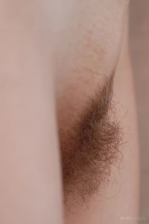 Blonde Peels Off Her Top to Reveal Her Hairy Pussy – photo 12 of 16