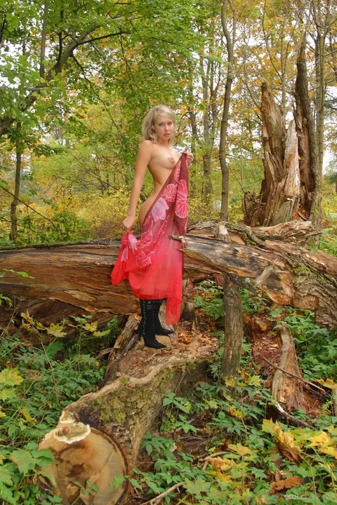 Woman Keeps Leather Boots On and Spreads in the Forest – photo 1 of 20