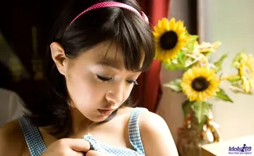 Japanese MILF Strips Out of Her Panties and Poses Nude