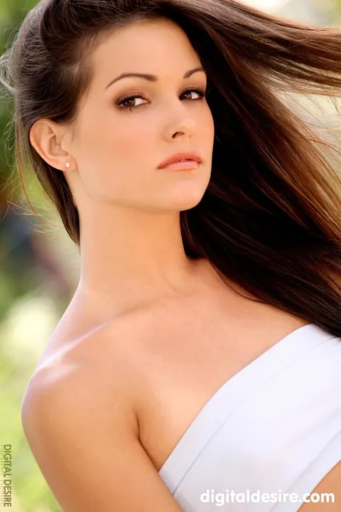 Brunette Undresses and Poses Nude in a Glamour Shoot – photo 3 of 21
