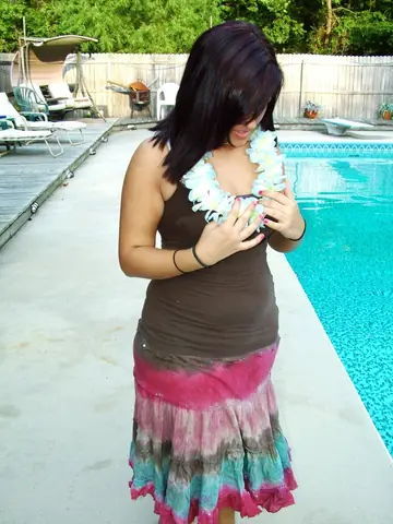 Redhead Strips Out of Her Dress to a White Bra Outside