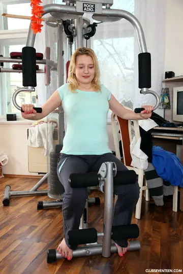 Petite Woman Fingers Her Shaved Pussy in the Gym