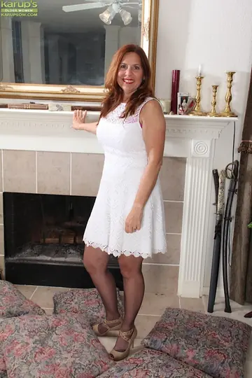 Mature Brunette with Big Natural Tits Strips Out of Her Lingerie and Pantyhose