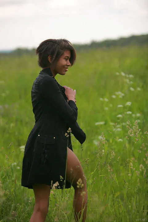 African Woman with Short Hair Spreads Outdoors – photo 21 of 21
