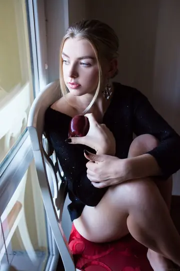 Blonde with Big Natural Tits Strips Out of Her Panties on a Chair