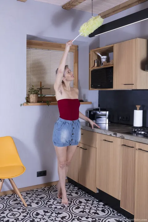 French Belle: Mature Blonde Shows Her Hairy Bush and Armpits on the Chair – photo 1 of 21