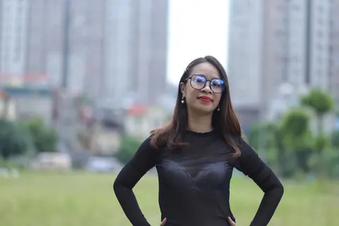 Asian Brunette in Glasses Poses Outdoors in Her Outfit – photo 19 of 21