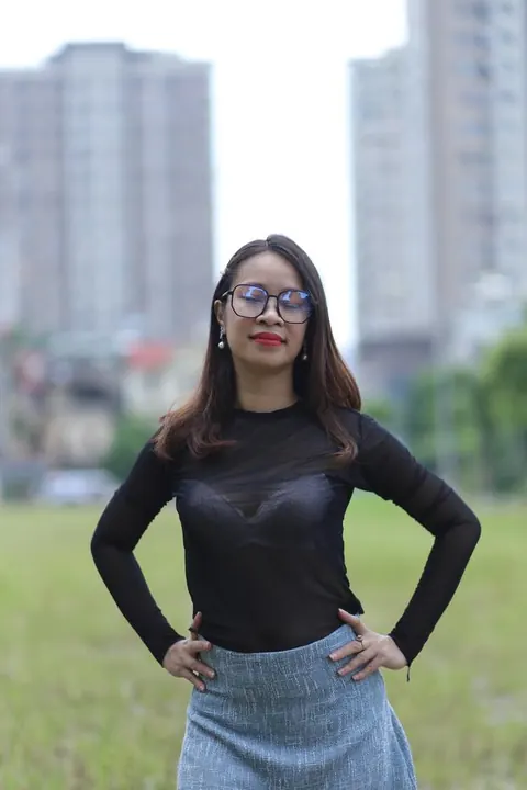Asian Brunette in Glasses Poses Outdoors in Her Outfit – photo 14 of 21