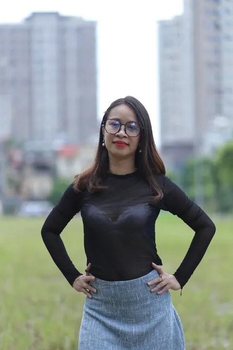 Asian Brunette in Glasses Poses Outdoors in Her Outfit – photo 13 of 21
