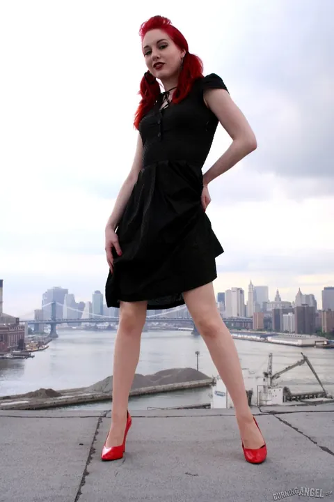 Angela Ryan: Busty Redhead Poses in Stockings and Heels on the Rooftop Balcony – photo 2 of 17