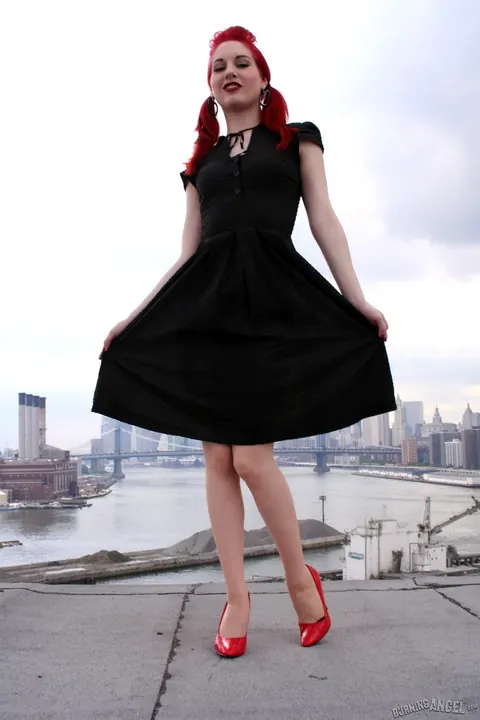 Angela Ryan: Busty Redhead Poses in Stockings and Heels on the Rooftop Balcony – photo 3 of 17