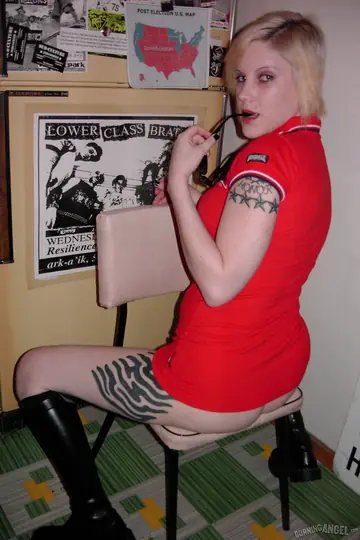 Short-Haired Blonde in a Red Dress and Boots Flashes Her Naked Body