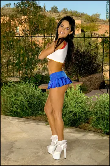 Lucia Tovar – Busty Latina MILF Poses in a Skirt and Heels