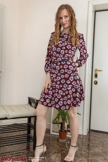 Slim Redhead MILF Strips Out of Her Lingerie and Skirt in Heels