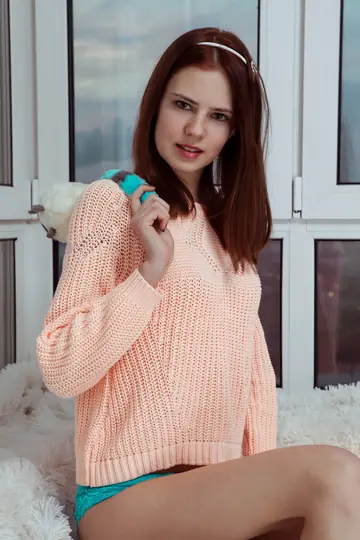 Slim Babe Spreads Her Shaved Pussy on Camera