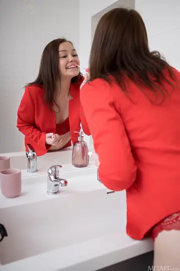 Petite European Poses Nude in the Bathroom Mirror