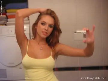 Suzy D – Petite Redhead Lifts Her Top to Flash Her Big Natural Tits in the Mirror