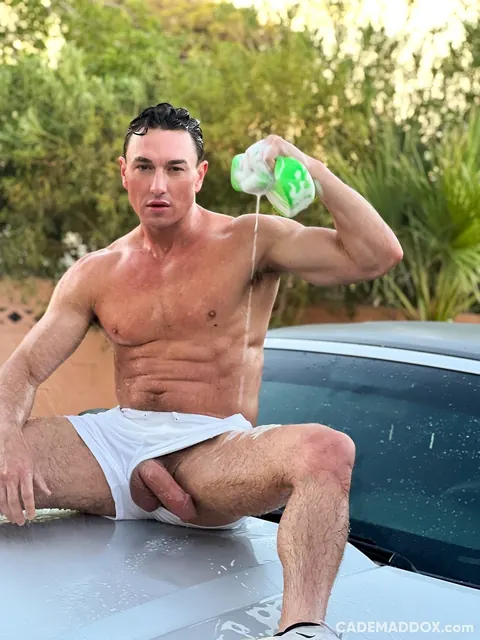 Muscular Guy Shows His Big Cock Outdoors by a Car – photo 9 of 10