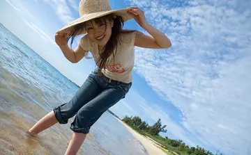 Japanese Beauty Strips Out of Her Shorts on the Beach