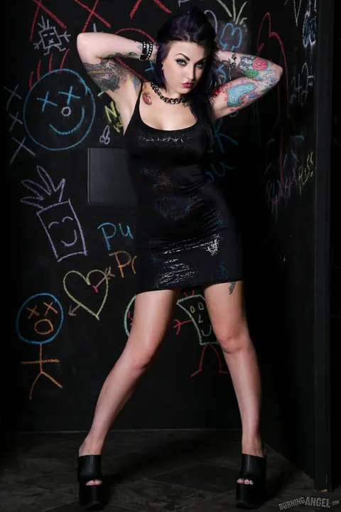 Draven Star: Brunette with Big Enhanced Tits Strips Off Her Skirt and Poses on Heels – photo 3 of 15