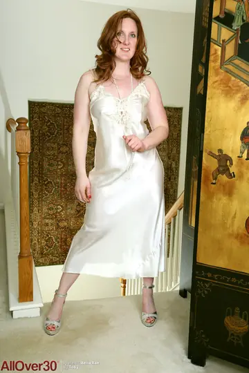 Busty Redhead MILF Strips Off Her Lingerie and Fingers Her Pussy