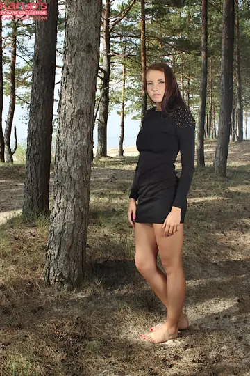 Lorette – Busty Brunette Strips Out of Her Skirt Outdoors and Spreads
