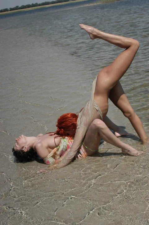 Redhead Spreads Her Pussy on the Beach – photo 10 of 21