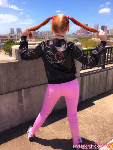 Krystal Orchid – Petite Redhead in Pigtails and Glasses Spreads Outdoors