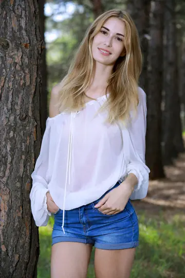 Tall Skinny Blonde Spreads Her Pussy in the Forest