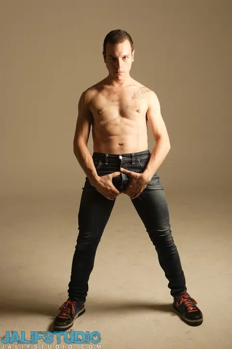 Man Strips Nude on a Chair and Poses – photo 2 of 21