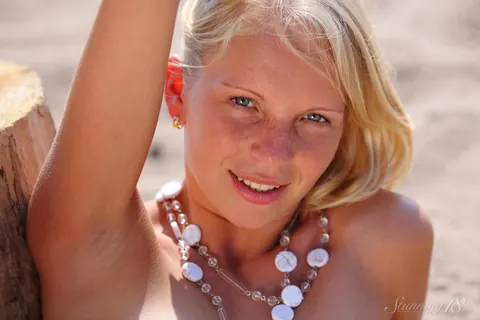 Olga W: Blonde Spreads Her Shaved Pussy on a Sandy Beach – photo 16 of 16