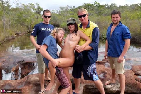 Brunette MILF in Glasses Has Group Sex Outdoors with Beer – photo 8 of 16