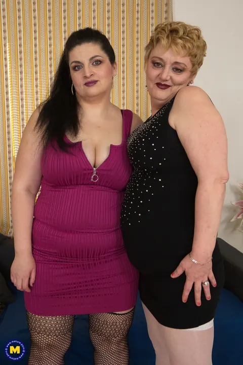 Two Mature BBW Women in Dresses and Stockings Kiss – photo 2 of 12