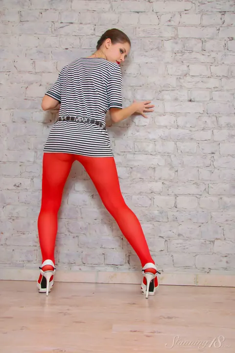 Brunette Bares Her Breasts and Peels Down Her Red Pantyhose – photo 2 of 16