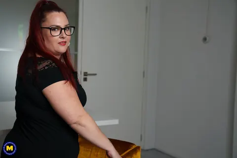 European MILF Teases Cleavage in Glasses – photo 17 of 17