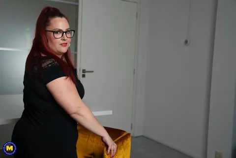 European MILF Teases Cleavage in Glasses – photo 16 of 17