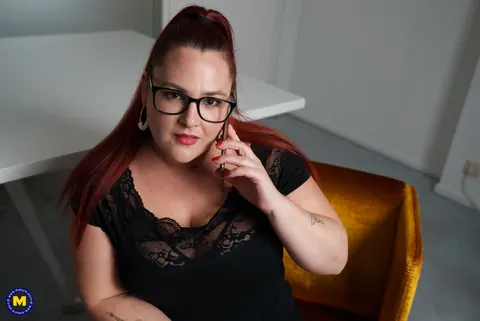 European MILF Teases Cleavage in Glasses – photo 8 of 17
