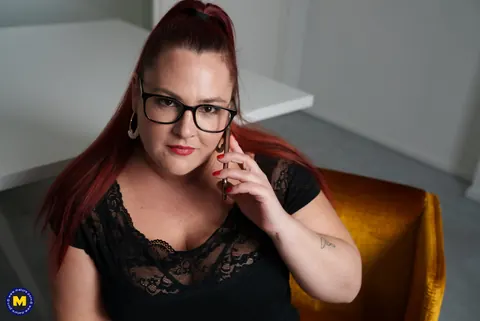 European MILF Teases Cleavage in Glasses – photo 6 of 17