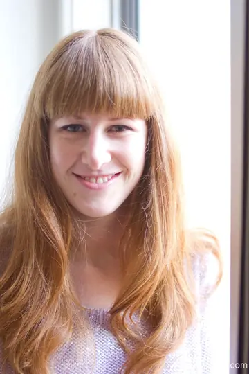 Busty Australian Redhead Flashes Her Tits by the Window