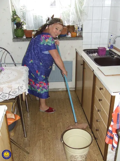 Thick Mature European Woman Strips Naked in the Kitchen – photo 1 of 20