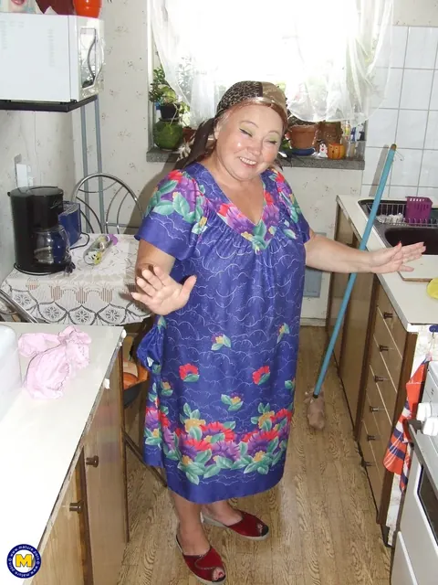 Thick Mature European Woman Strips Naked in the Kitchen – photo 8 of 20