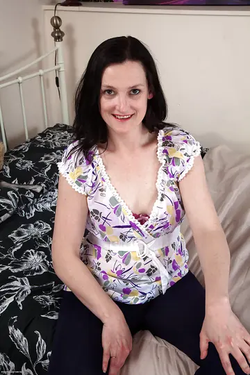 Thick Brunette MILF Bares Her Small Natural Tits and Spreads Her Hairy Pussy