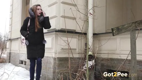 Woman in Jeans and Boots Pulls Them Down to Piss on the Steps – photo 2 of 15