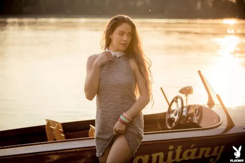 Joy Draiki: Curly Brunette Poses Nude on a Boat Outdoors – photo 14 of 16