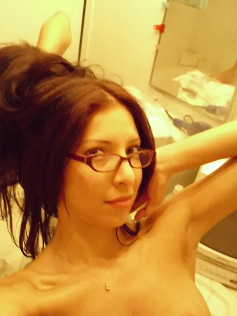 Cydella Jimenez: Busty Latina in Glasses Snaps Bathroom Selfies in Her Clothes – photo 7 of 21
