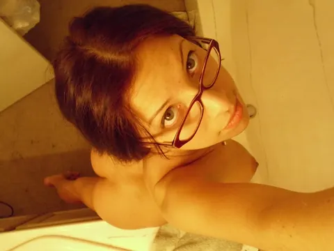 Cydella Jimenez: Busty Latina in Glasses Snaps Bathroom Selfies in Her Clothes – photo 3 of 21