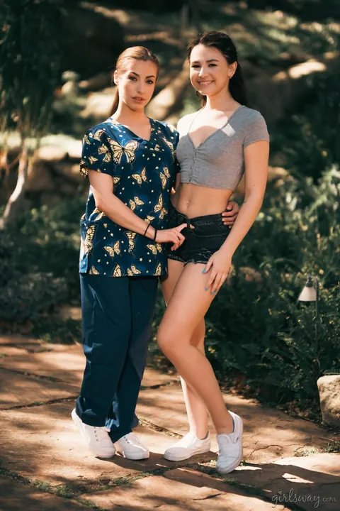 Spencer Bradley: Two Brunette Nurses in Shorts Share a Lesbian Kiss Outdoors – photo 5 of 15